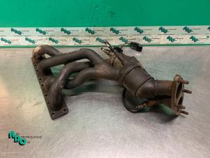 Used Exhaust manifold + catalyst BMW 3 serie Compact (E46/5) 316ti 16V Price € 200,00 Margin scheme offered by Autodemontagebedrijf Otte