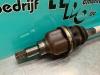 Front drive shaft, left from a Peugeot 208 I (CA/CC/CK/CL) 1.4 HDi 2012