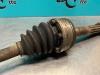 Front drive shaft, left from a Volkswagen Transporter T3 1.6 D 1983