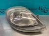 Headlight, right from a Renault Trafic New (FL) 1.9 dCi 100 16V 2003