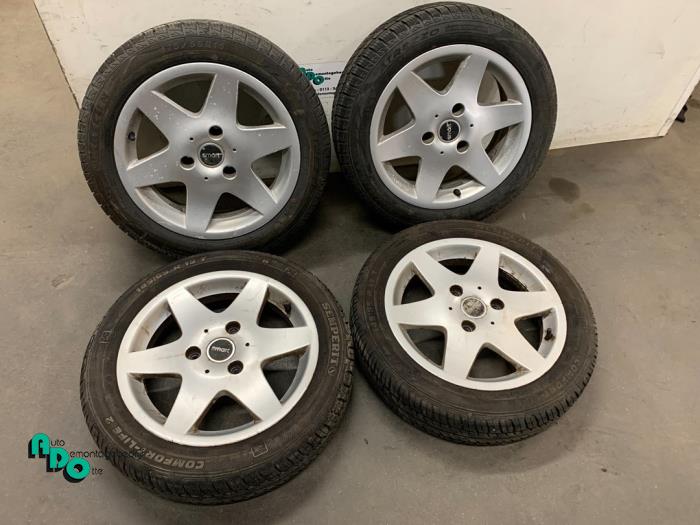 Set of wheels + tyres from a Smart City-Coupé 0.6 Turbo i.c. 2002