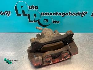 Used Front brake calliper, left Seat Leon (1P1) 2.0 TDI 16V FR Price € 25,00 Margin scheme offered by Autodemontagebedrijf Otte