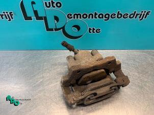 Used Rear brake calliper, left BMW 3 serie (E46/2) 318 Ci 16V Price € 25,00 Margin scheme offered by Autodemontagebedrijf Otte