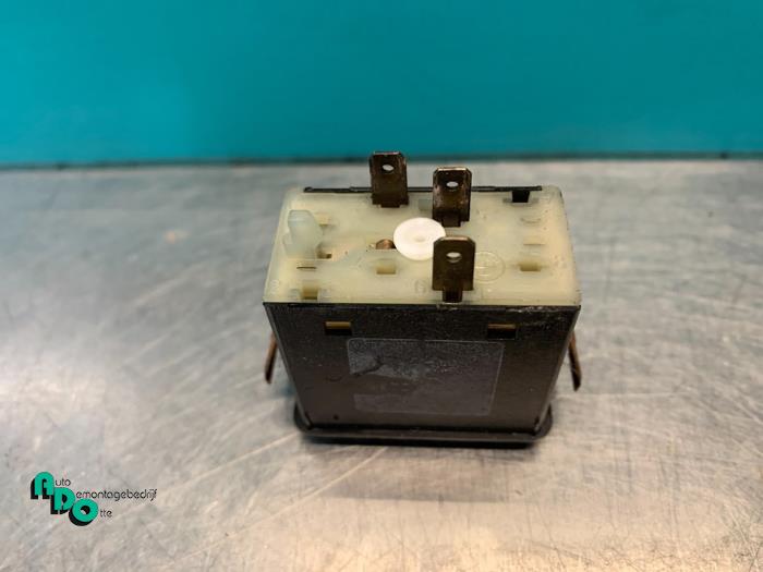 Rear window heating switch from a BMW 3 serie (E30/2) (E30/4) 320i 1985