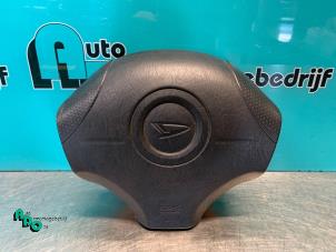 Used Left airbag (steering wheel) Daihatsu Sirion/Storia (M1) 1.3 16V DVVT Price € 30,00 Margin scheme offered by Autodemontagebedrijf Otte