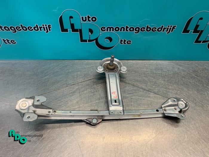 Door manual window regulator