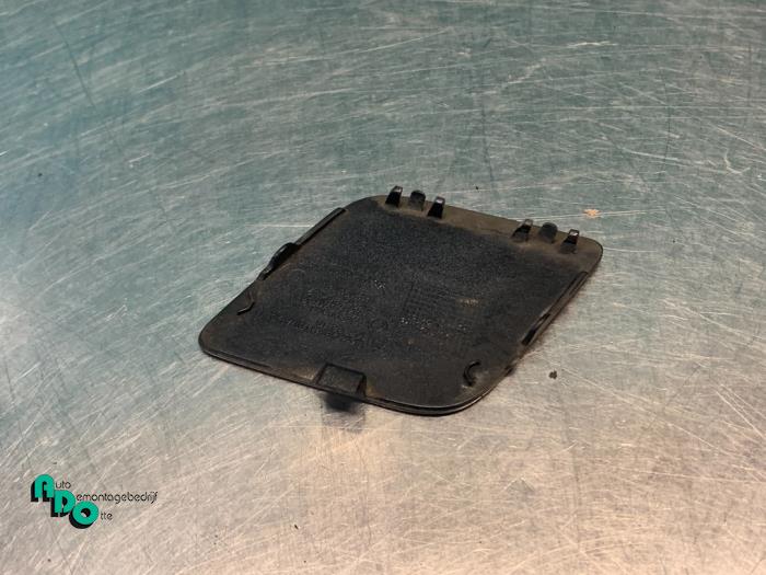 Tow hook cover