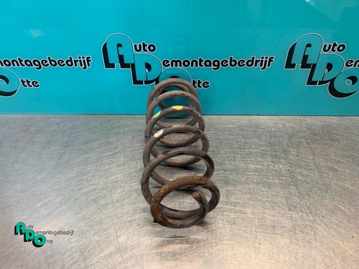 Rear coil spring from a Peugeot 307 CC (3B) 2.0 16V 2003