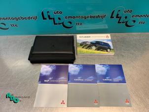Used Instruction Booklet Mitsubishi Outlander (CU) 2.0 16V 4x2 Price € 20,00 Margin scheme offered by Autodemontagebedrijf Otte