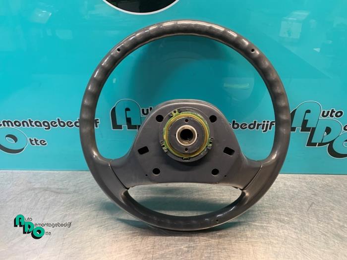 Steering wheel from a Toyota Starlet (EP8/NP8) 1.3 Friend,XLi 12V 1993