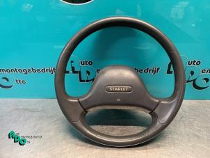 Used Steering wheel Toyota Starlet (EP8/NP8) 1.3 Friend,XLi 12V Price € 25,00 Margin scheme offered by Autodemontagebedrijf Otte
