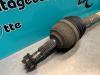 Front drive shaft, left from a Renault Clio III (BR/CR) 1.2 16V 65 2007