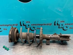 Used Front shock absorber rod, right Nissan Note (E11) 1.4 16V Price € 35,00 Margin scheme offered by Autodemontagebedrijf Otte