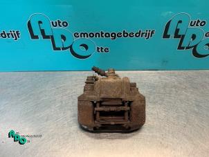 Used Front brake calliper, right Daihatsu Cuore (L251/271/276) Price € 15,00 Margin scheme offered by Autodemontagebedrijf Otte