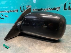 Used Wing mirror, left Toyota Corolla (E11) 1.6 16V Price € 30,00 Margin scheme offered by Autodemontagebedrijf Otte