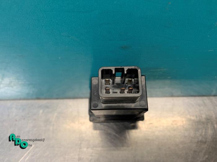 Rear window heating switch from a Toyota Starlet (EP8/NP8) 1.3 Friend,XLi 12V 1991