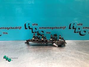 Usagé Système d'injection Renault Twingo II (CN) 1.2 16V Prix € 40,00 Règlement à la marge proposé par Autodemontagebedrijf Otte