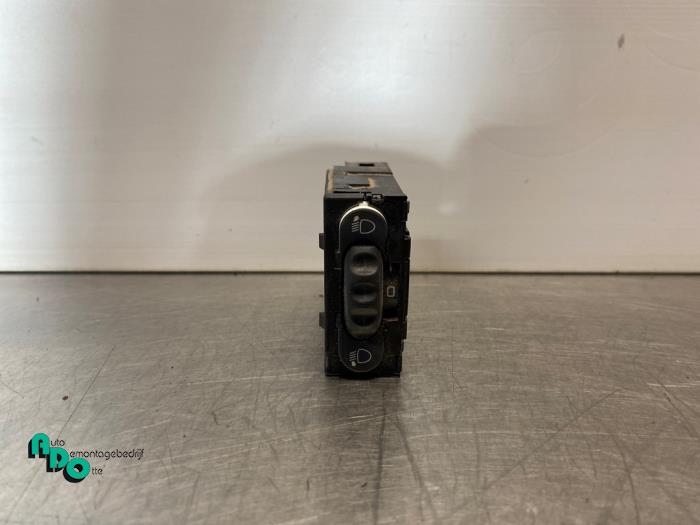 Headlight level height control switch