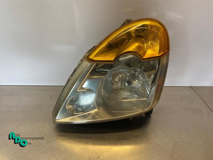 Używane Reflektor lewy Renault Modus/Grand Modus (JP) 1.4 16V Cena € 40,00 Procedura marży oferowane przez Autodemontagebedrijf Otte