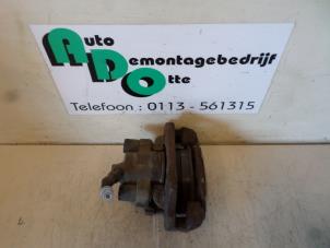 Used Rear brake calliper, left BMW 3 serie (E46/4) 318i Price € 25,00 Margin scheme offered by Autodemontagebedrijf Otte