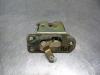 Tailgate lock mechanism from a Mitsubishi Colt (CJ) 1.3 GL,GLX 12V 1997