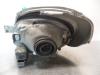 Headlight, right from a Renault Trafic New (FL) 1.9 dCi 100 16V 2002
