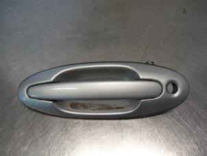 Used Door handle 2-door, left Hyundai Coupe Price € 25,00 Margin scheme offered by Autodemontagebedrijf Otte