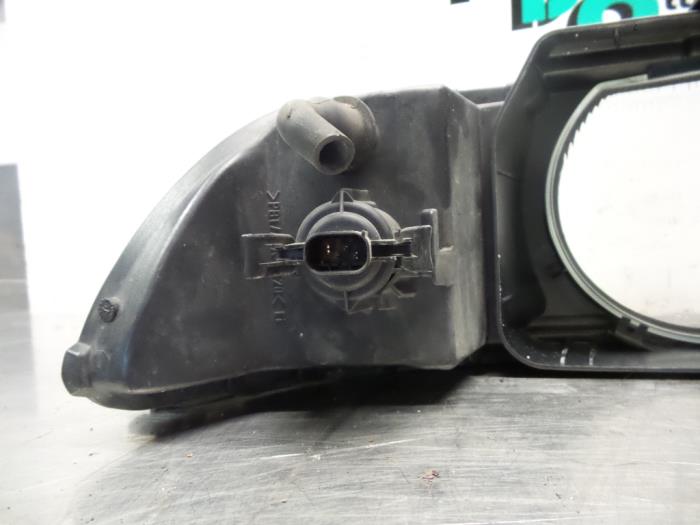 Headlight lens, left from a BMW 5 serie Touring (E39) 523i 24V 1998