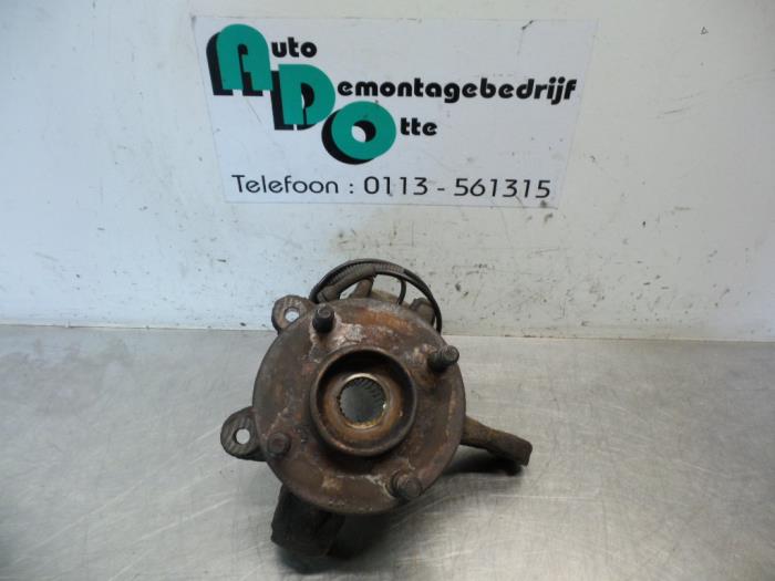 Knuckle, front left from a Ford Fiesta 5 (JD/JH) 1.4 TDCi 2004