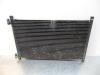 Air conditioning condenser from a Fiat Punto II (188) 1.8 HGT 16V 3-Drs. 2000