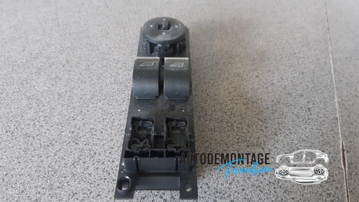 Electric window switch from a Ford Fiesta 6 (JA8) 1.4 16V 2014