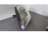Headlight, left from a Renault Trafic New (JL) 2.0 dCi 16V 90 2007