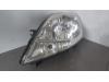 Headlight, left from a Renault Trafic New (JL) 2.0 dCi 16V 90 2007