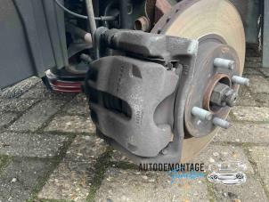 Used Front brake calliper, left Nissan Micra (K13) 1.2 12V Price on request offered by Franken Autodemontage B.V.
