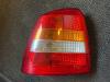Taillight, left from a Opel Astra G (F08/48), 1998 / 2009 1.6, Hatchback, Petrol, 1.598cc, 55kW (75pk), FWD, X16SZR, 1998-02 / 2001-06 1998