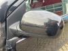 Wing mirror, left from a Nissan Note (E11) 1.6 16V 2006
