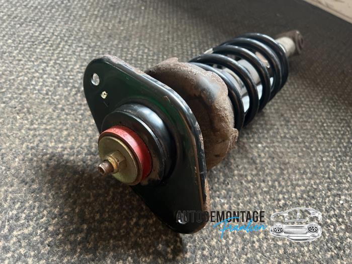 Rear shock absorber, left Mini Mini One/Cooper 1.6 16V Cooper ...
