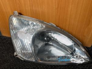 Used Headlight, right Toyota Prius (NHW11L) 1.5 16V Price on request offered by Franken Autodemontage B.V.