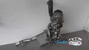 Used Oil filter housing Opel Astra J GTC (PD2/PF2) 1.4 Turbo 16V ecoFLEX 140 Price on request offered by Franken Autodemontage B.V.