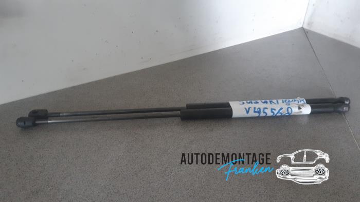 Set of tailgate gas struts from a Suzuki New Ignis (MH) 1.5 16V 2005