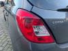 Feu arrière secondaire gauche d'un Opel Corsa D 1.3 CDTi 16V ecoFLEX 2012