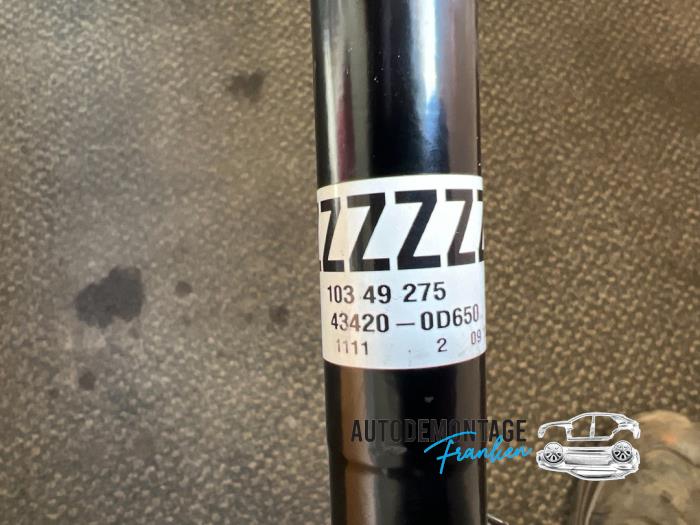 Front drive shaft, left from a Toyota Yaris III (P13) 1.5 16V Hybrid 2020