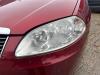 Headlight, left from a Fiat Croma (194), 2005 / 2011 2.2 MPI 16V, Hatchback, Petrol, 2.198cc, 108kW (147pk), FWD, 194A1000, 2005-06 / 2010-12, 194AXA1A; 194AXA12 2005