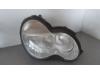 Headlight, right from a Mercedes-Benz C (W203) 2.0 C-180 16V 2001