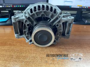 Dynamo van een Volkswagen Tiguan (5N1/2) 2.0 TSI 16V 4Motion 2011