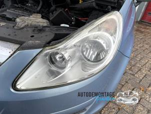 Używane Reflektor lewy Opel Corsa D 1.0 Cena na żądanie oferowane przez Franken Autodemontage B.V.