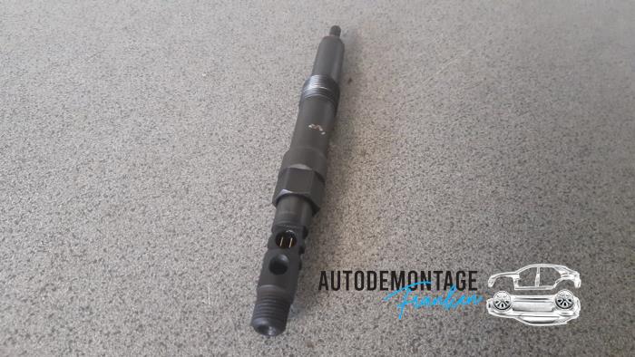 Injector (diesel) from a Ford Mondeo III 2.0 TDCi 130 16V 2005