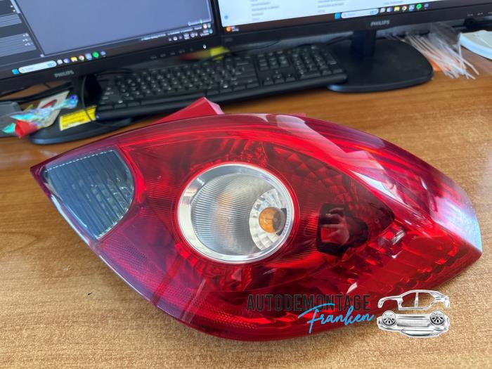Taillight, right from a Opel Corsa D 1.2 16V 2008