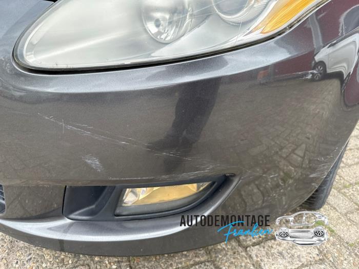 Front bumper from a Fiat Bravo (198A) 1.4 T-Jet 16V 120 2008