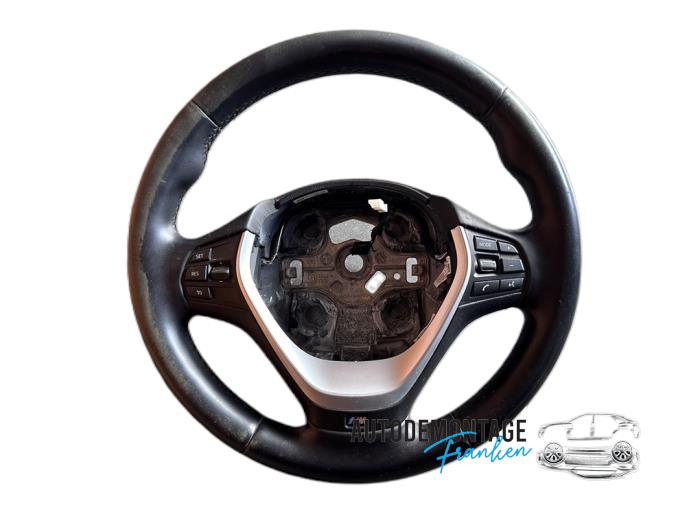 Używane Kierownica BMW 1 serie (F21) 114i 1.6 16V Cena € 150,00 Procedura marży oferowane przez Franken Autodemontage B.V.